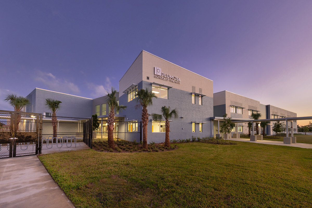 Architectural dusk view of the Plumosa School of the Arts in Delray Beach. FL.